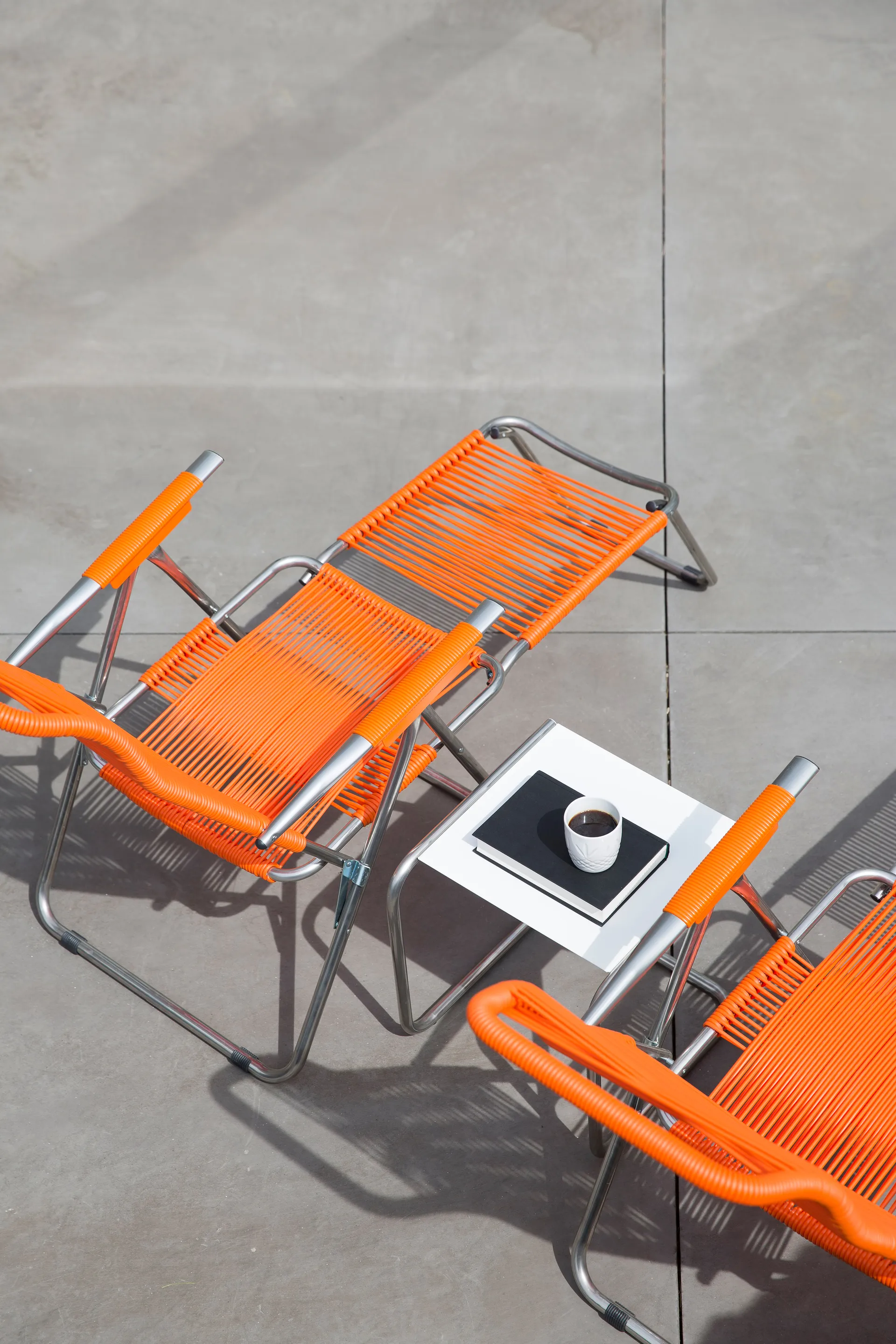 Spaghetti sun lounger with footrest, Orange Fiam