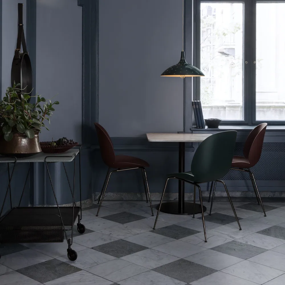 Beetle chair, Amber brown, brass legs GUBI