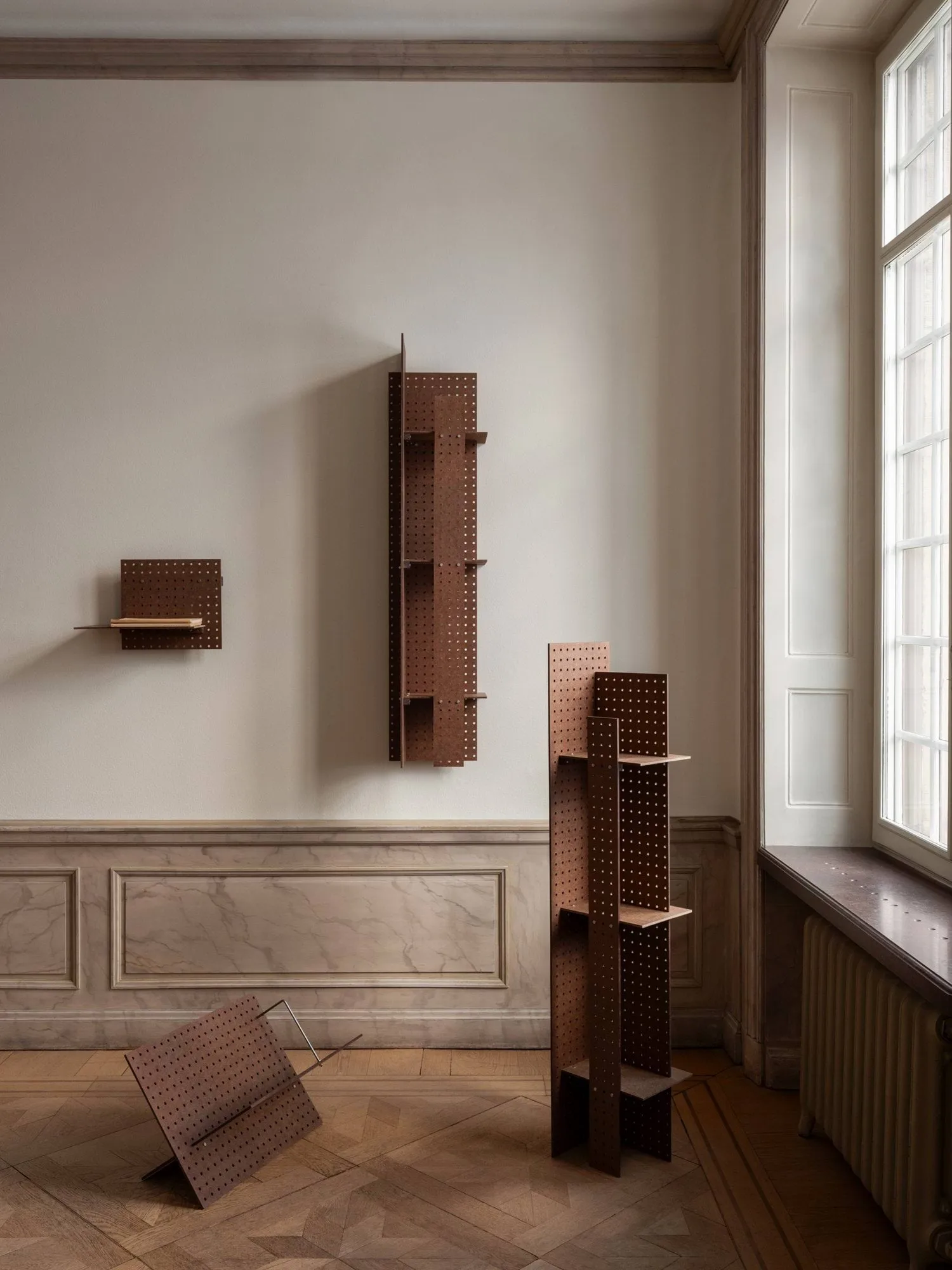 FF01 The Perforated Furniture book cradle, Masonite-walnut, 53x33x54 Källemo