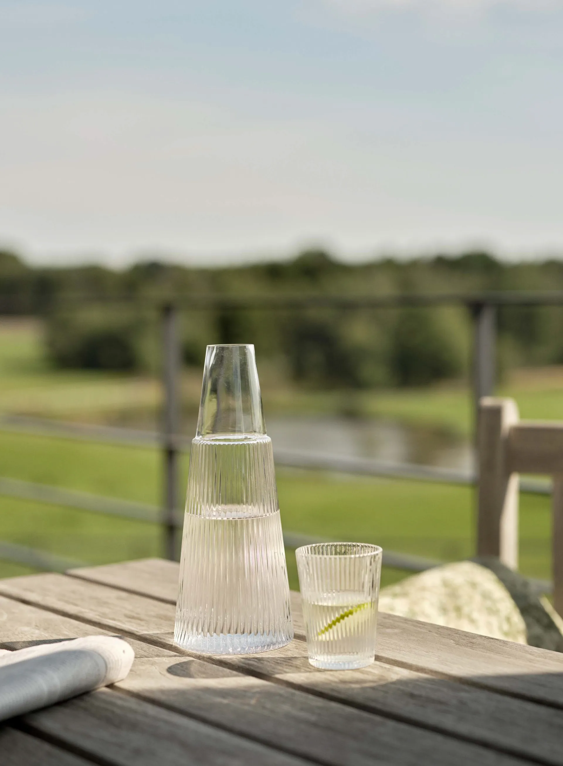 Pilastro carafe with drinking glass, Clear Stelton