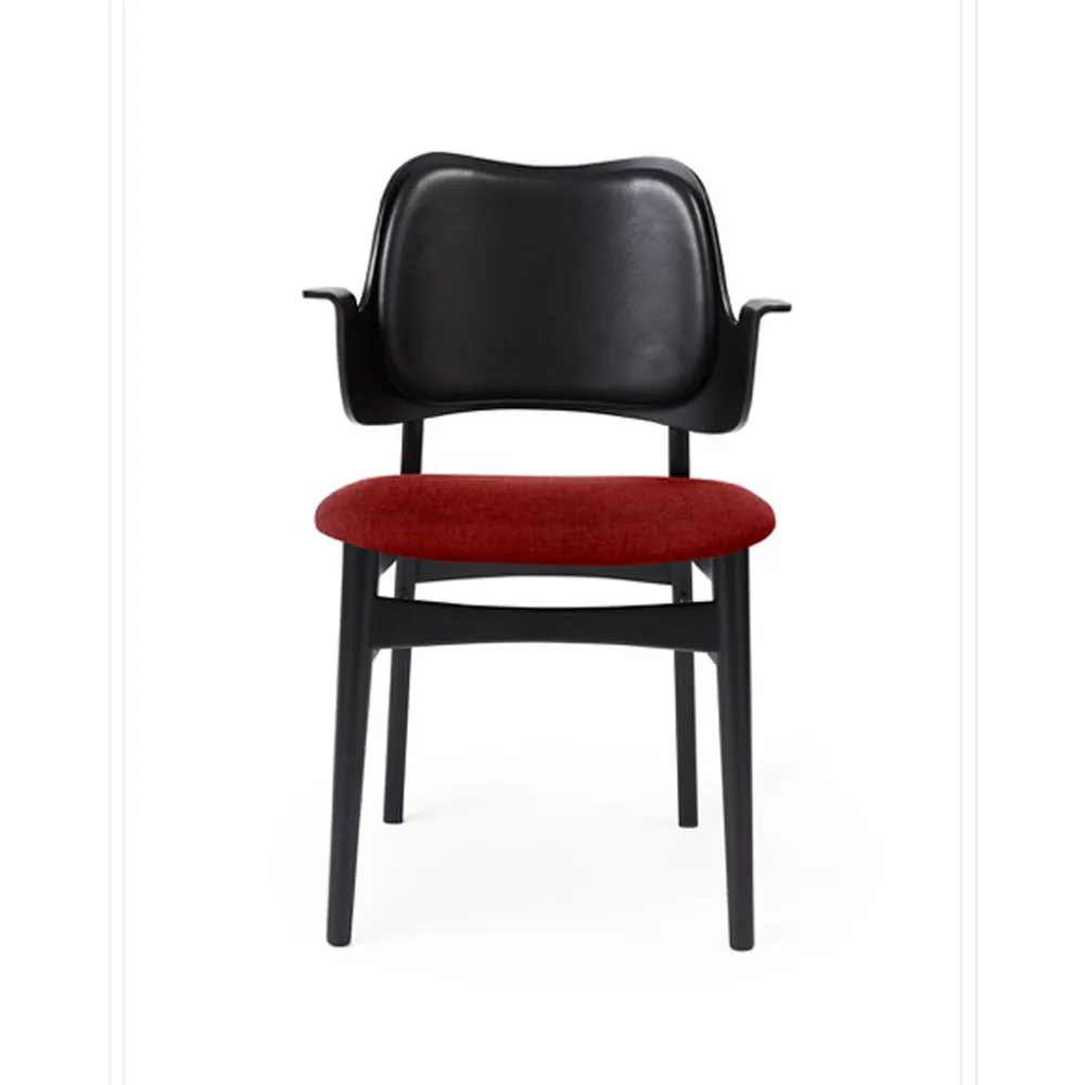 Gesture chair, upholstered seat and back, Fabric brick red, leather backrest, black lacquered beech legs Warm Nordic