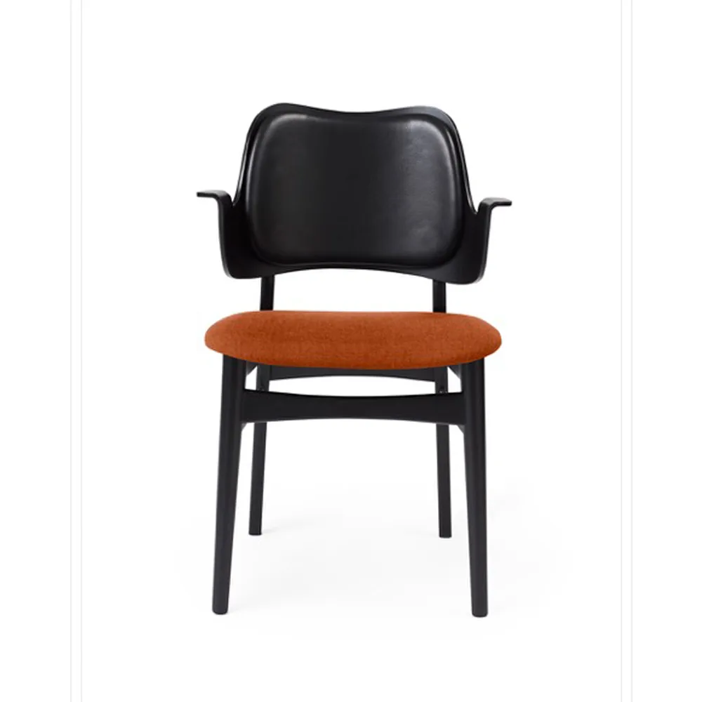 Gesture chair, upholstered seat and back, Fabric rusty rosé, leather backrest, black lacquered beech legs Warm Nordic