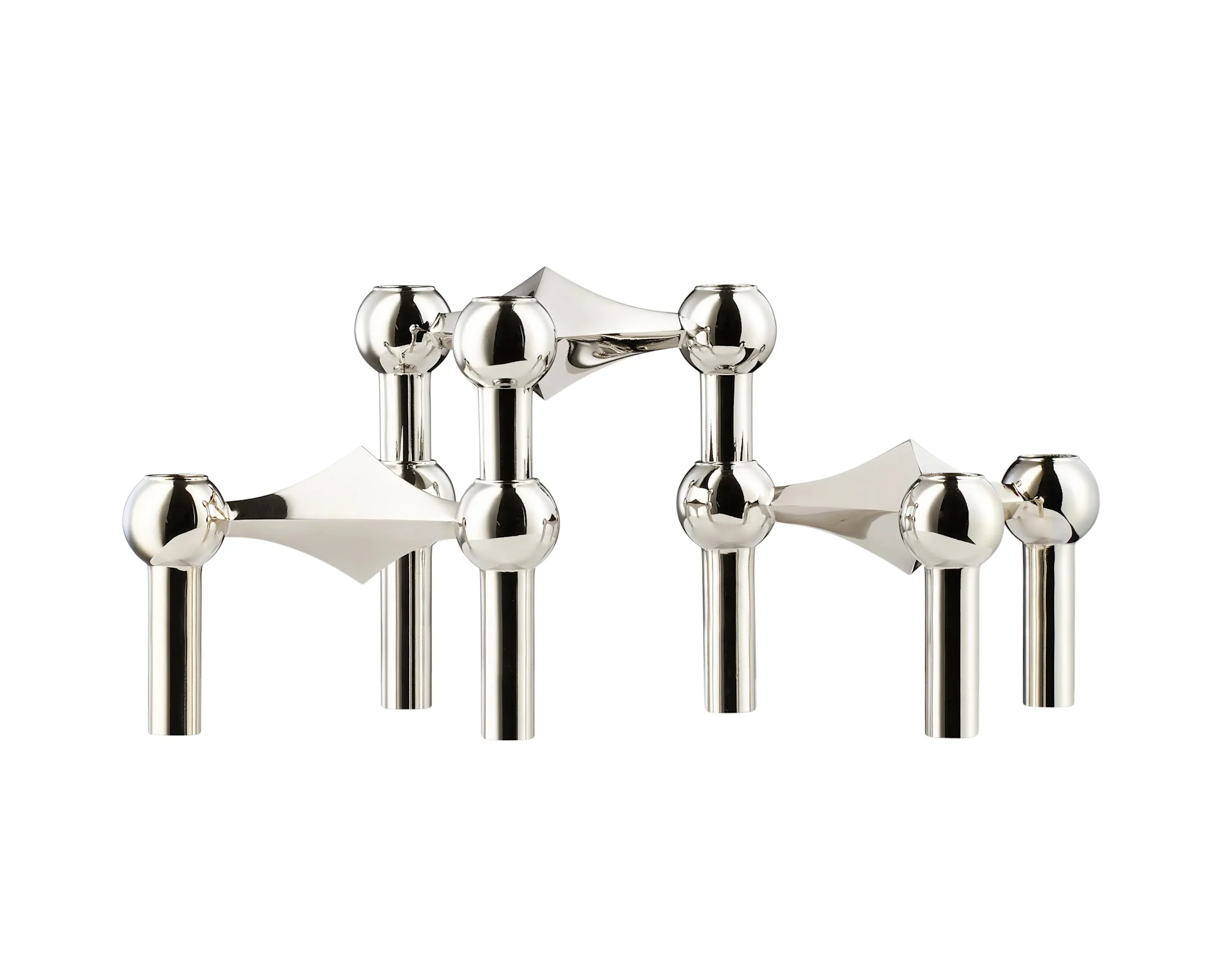 A shiny, silver-colored modular candlestick holder with spherical and cylindrical elements connected by pointed shapes, against a white background.